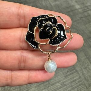 Elegant Black and Gold Rose Brooch with Pearl